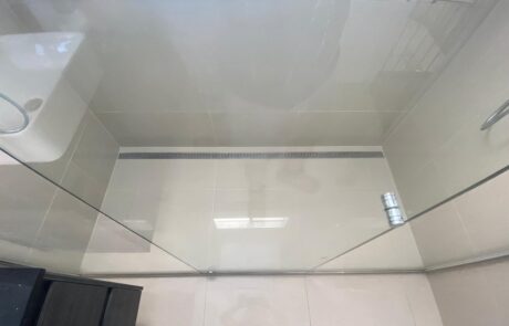 Newly retiled shower base in Biggera Waters, exemplifying high-quality craftsmanship.